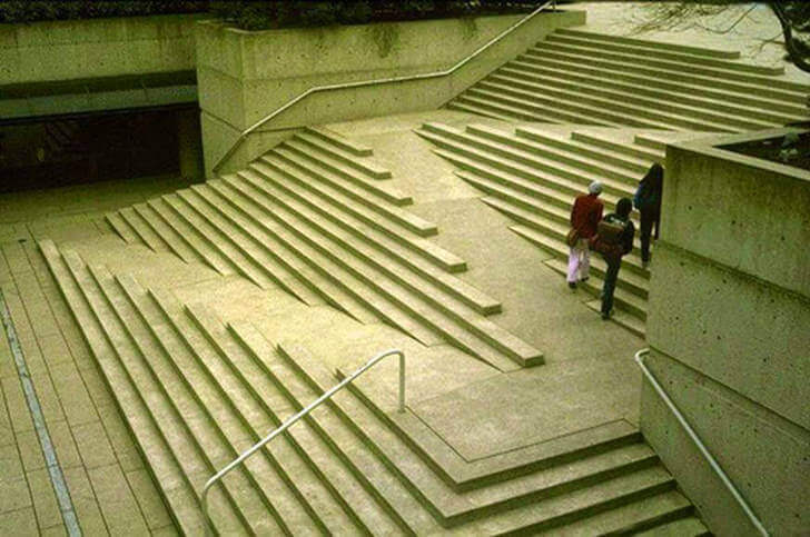 Ramp blended into stairs, criss-crossing across the stairs.