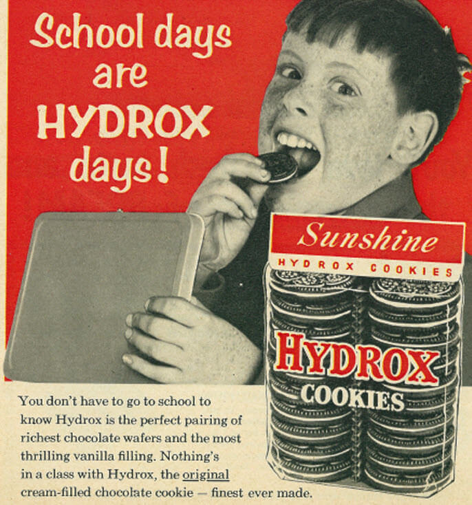 Child eating cookie from lunch box with text “School days are HYDROX days!”
