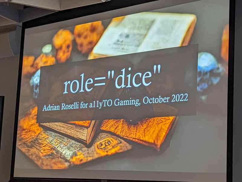 Slide on background of tabletop roleplaying paraphernalia. role="dice" Adrian Roselli for a11yTO Gaming , October 2022